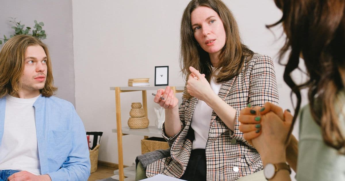 Therapist and patient in a comfortable counseling office session