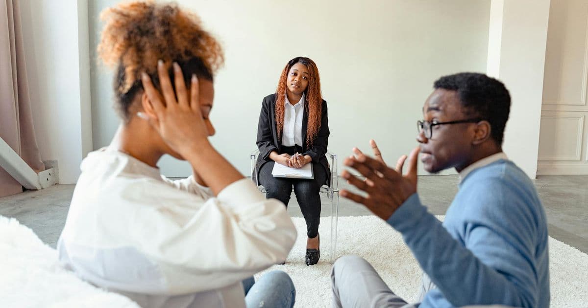 Couple in a therapy session with a counselor