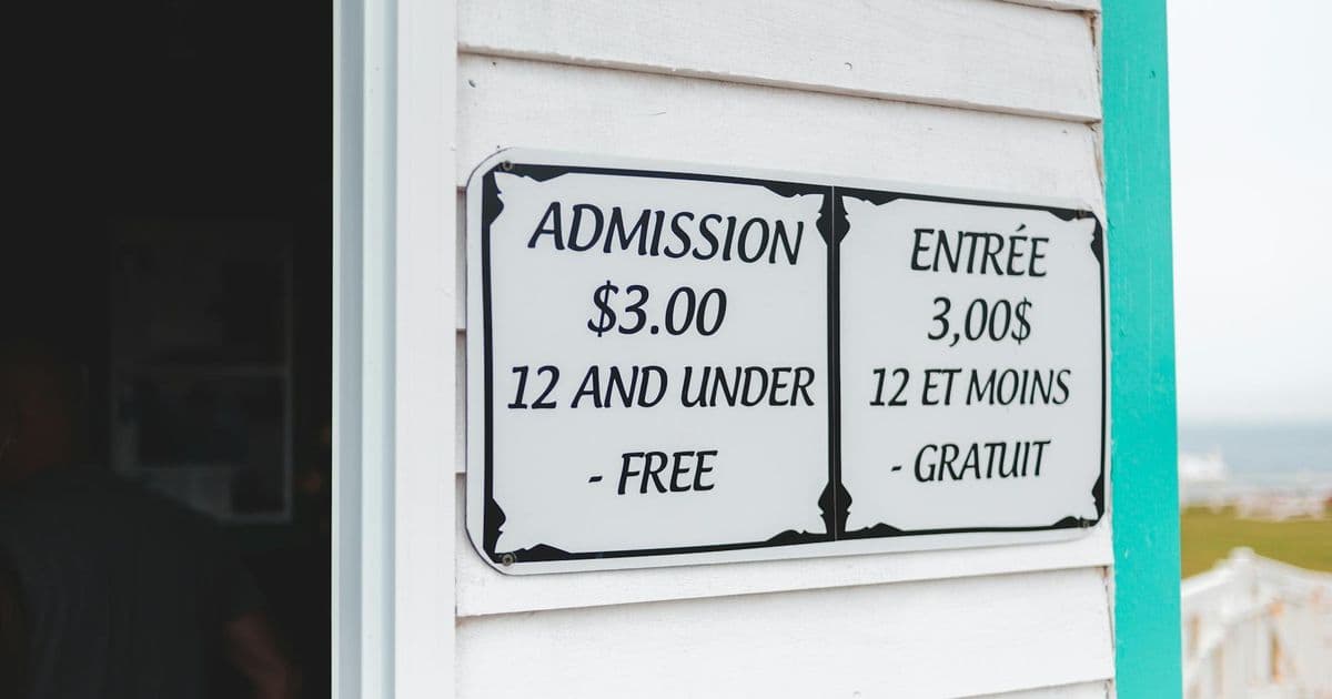 Professional reviewing pricing and fee structures at a desk