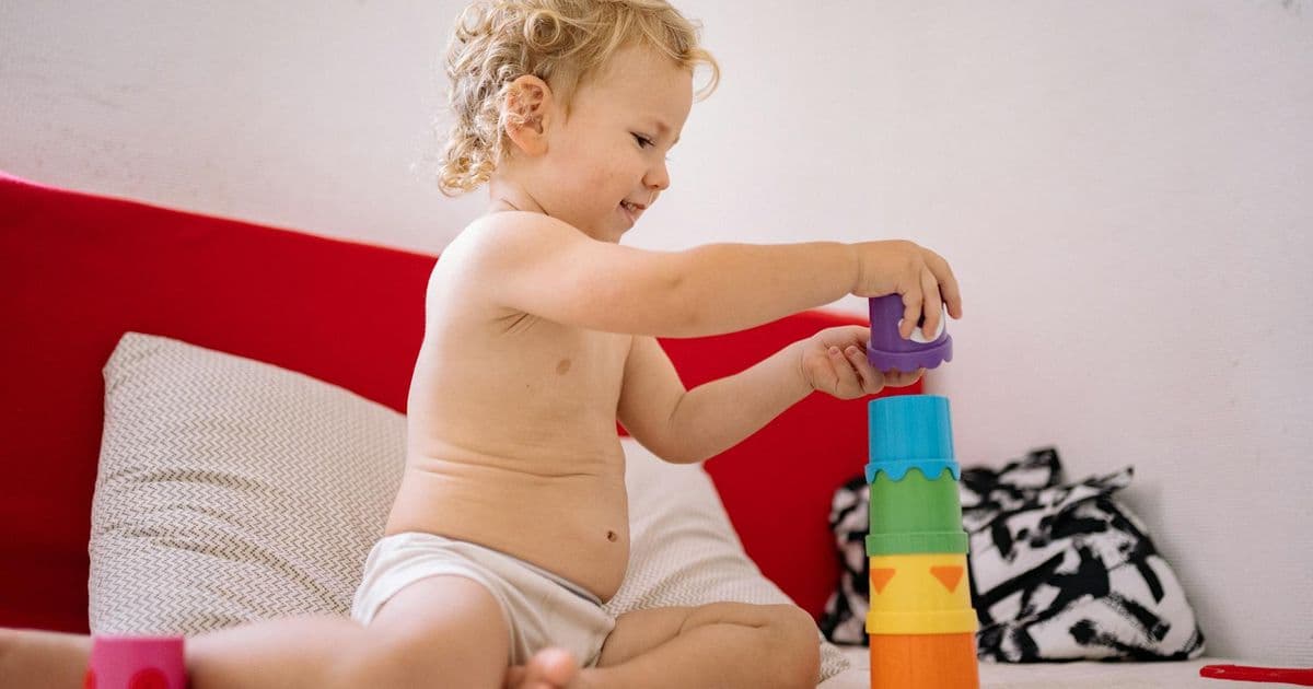 Child playing during a play therapy session with toys