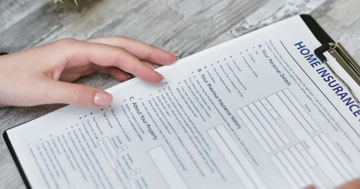 Person calling to verify insurance benefits on a phone
