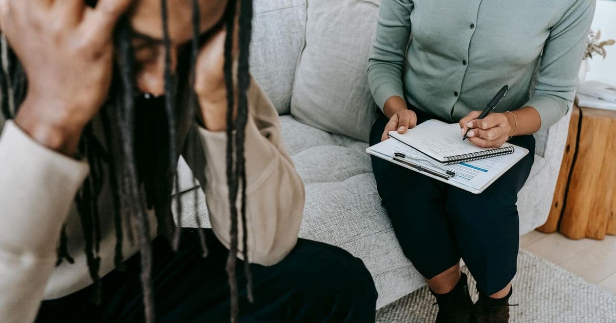 Therapist speaking with a patient about depression