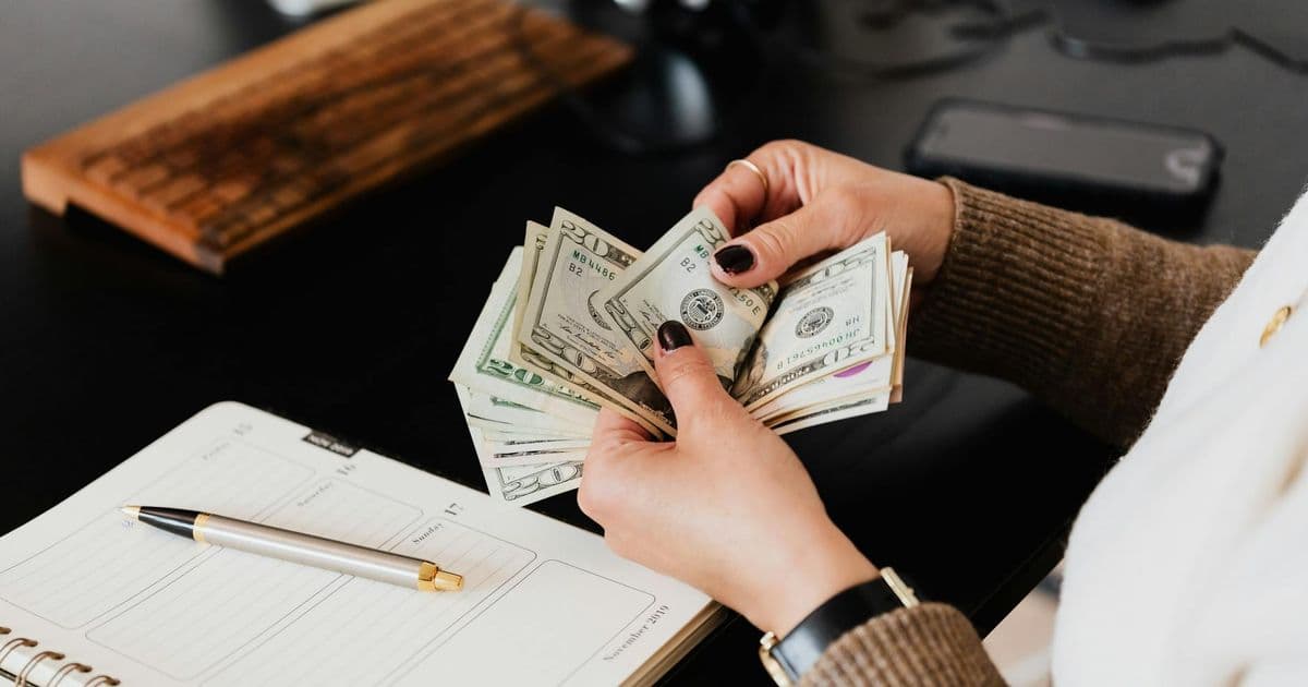 Therapist reviewing billing codes at a professional desk
