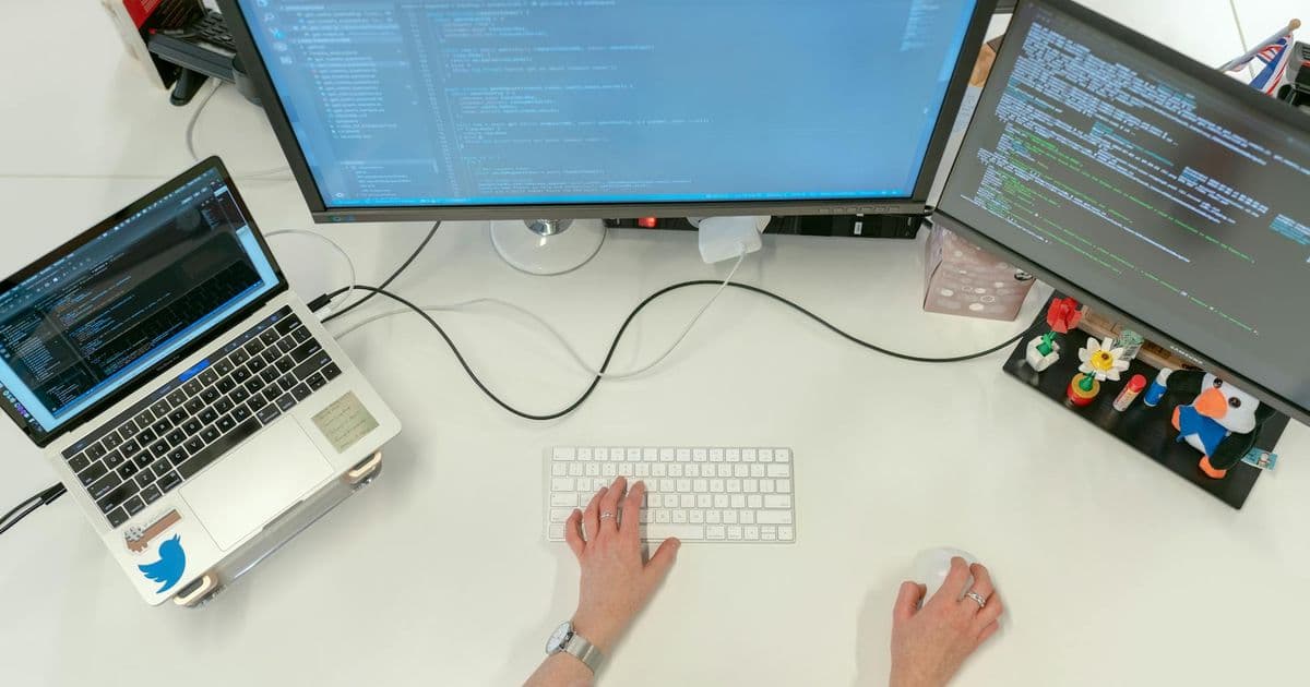 Therapist conducting a telehealth session at a professional desk